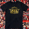 Black t-shirt with gold 'ATL UTD' logo on a collage background