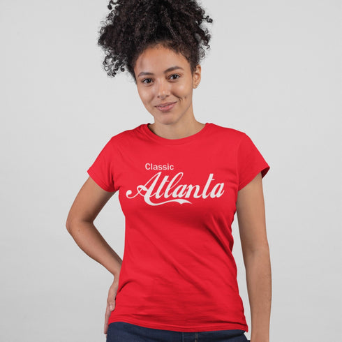 Person wearing a red 'Classic Atlanta' t-shirt on a plain background
