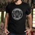 Man wearing a black t-shirt with a Phoenix rising from the ashes on the front.