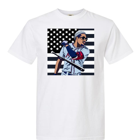 White t-shirt with a graphic of a person holding a baseball bat against an American flag background.