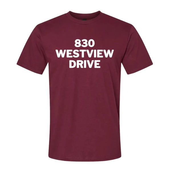Maroon t-shirt with '830 Westview Drive' in white text, honoring a shared legacy.