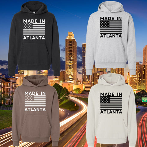 Four 'Made in Atlanta' hoodies displayed with a cityscape background