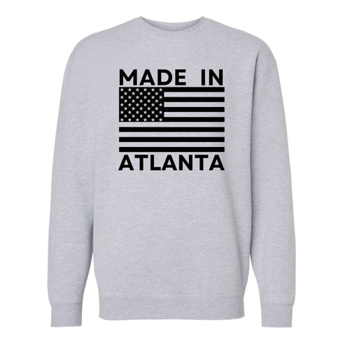 Gray sweatshirt with 'Made in Atlanta' text and American flag design on a white background