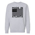 Gray sweatshirt with 'Made in Atlanta' text and American flag design on a white background