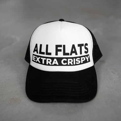 Black and white cap with 'ALL FLATS EXTRA CRISPY' text on a gray background