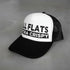 Side view of white and black All Flats Extra Crispy Trucker Hat, inspired by Atlanta wing culture, with adjustable fit.