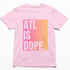 Pink t-shirt with 'ATL IS DOPE' text on a white background
