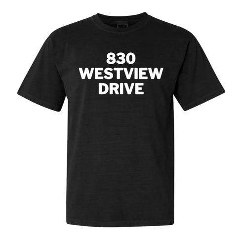 Black t-shirt with '830 Westview Drive' in white text, honoring a shared legacy.
