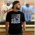 Man wearing a black t-shirt with an American flag and a bold Braves 3000 graphic.