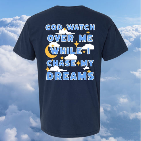 Navy blue t-shirt with motivational quote on a cloudy sky background