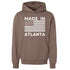 Brown hoodie with 'Made in Atlanta' text and American flag design on a white background