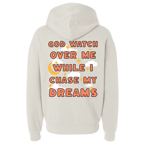 Beige hoodie with text 'God watch over me while I chase my dreams' on the back.