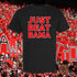Black t-shirt with 'JUST BEAT BAMA' text in red, set against a background of people holding signs and cheering.