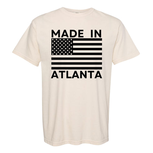 Beige t-shirt with 'Made in Atlanta' design featuring an American flag on a white background