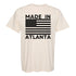 Beige t-shirt with 'Made in Atlanta' design featuring an American flag on a white background