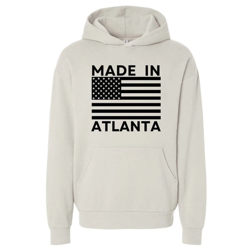 Ivory Made in Atlanta hoodie with bold American Flag front print