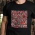 Black t-shirt with a colorful collage design on a person wearing it.
