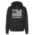 Black hoodie with 'Made in Atlanta' text and American flag design on a white background