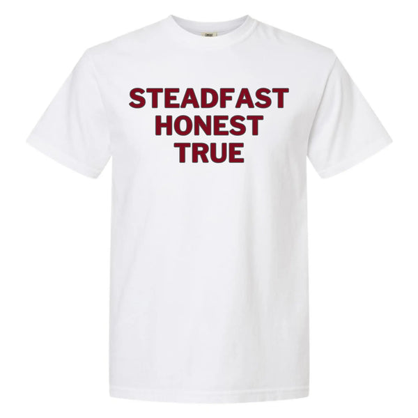 White Steadfast Honest True graphic tee featuring bold black lettering in a clean minimalist design